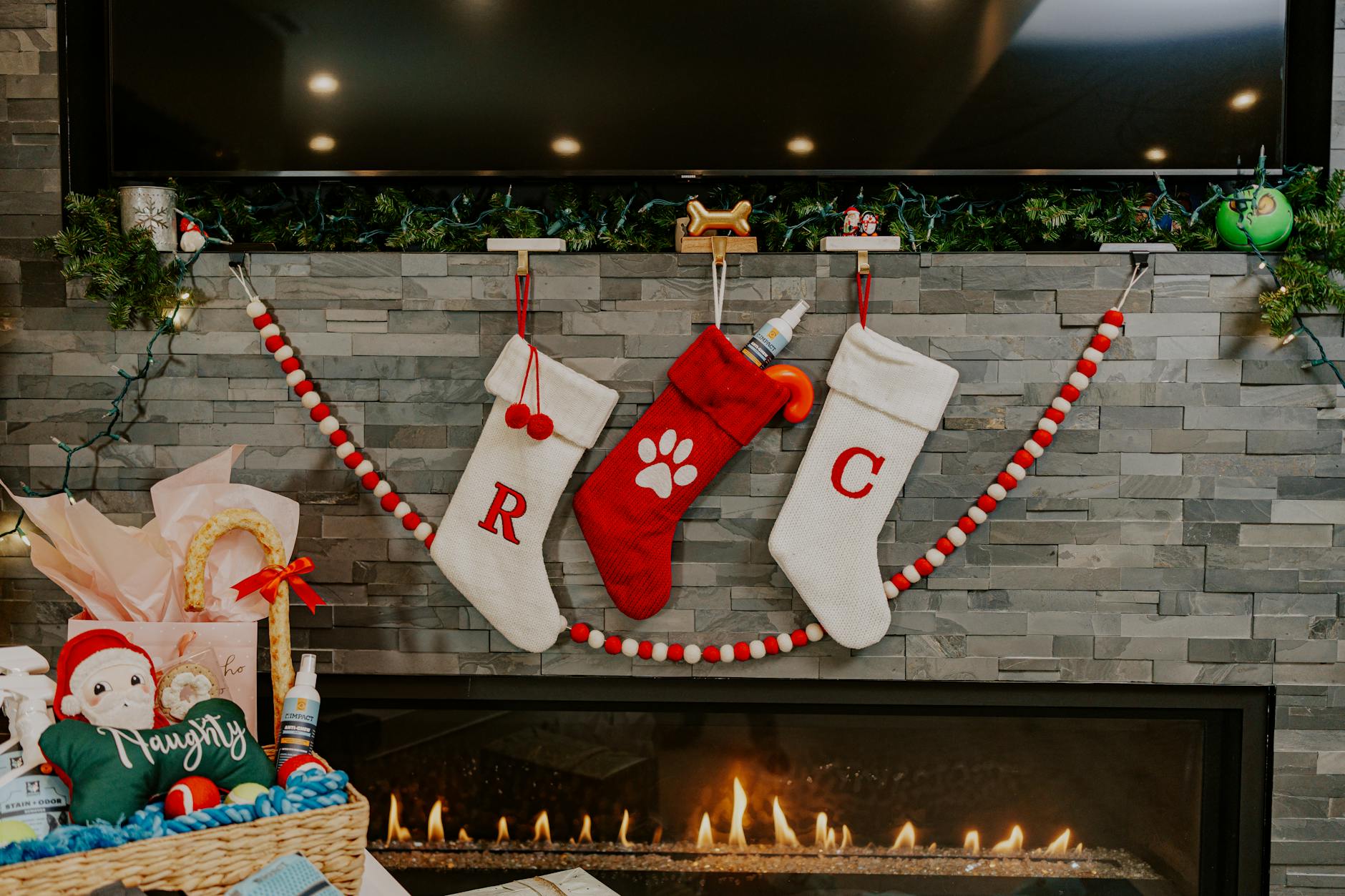 cozy christmas fireplace with stockings and decor