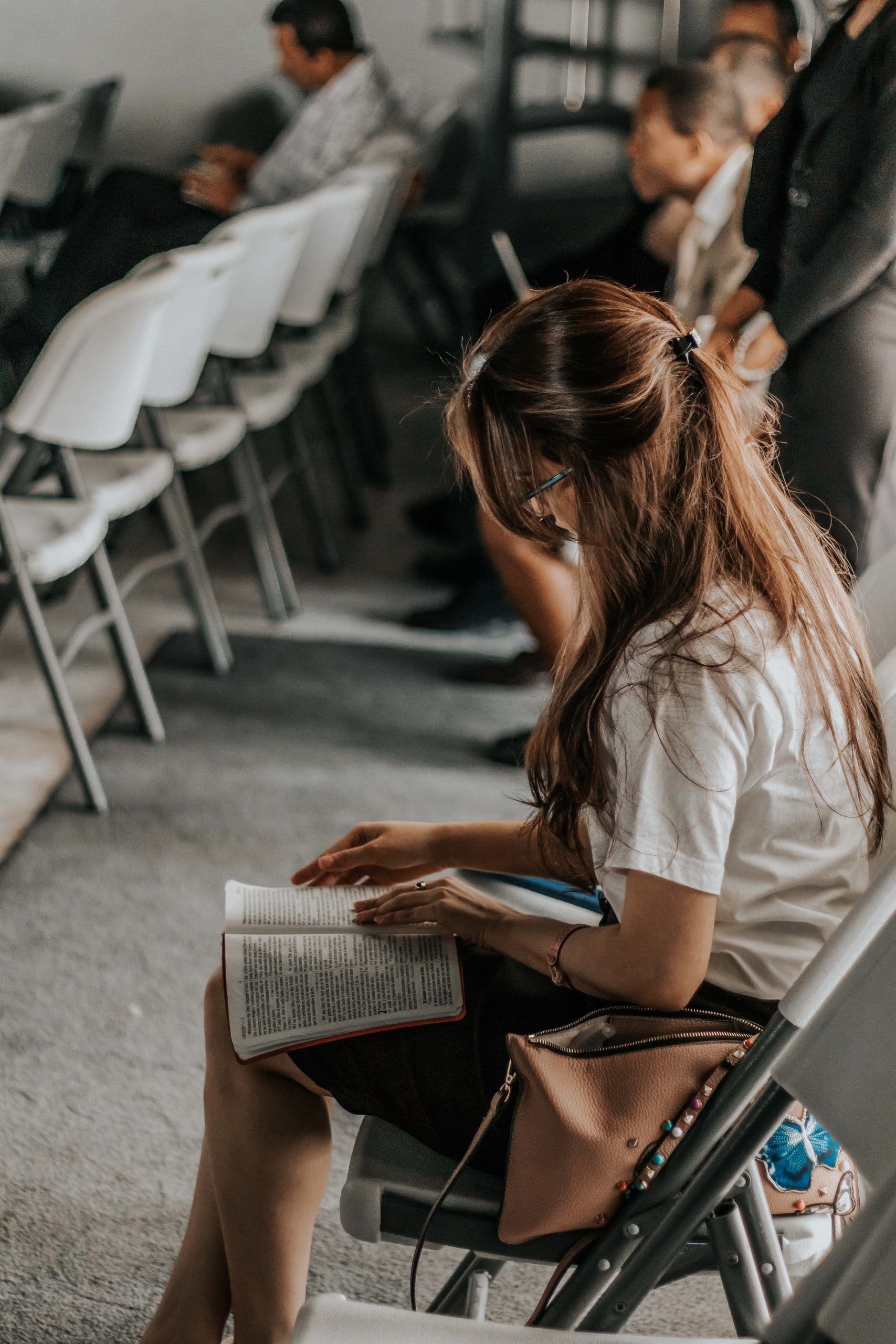 School girl reading a book