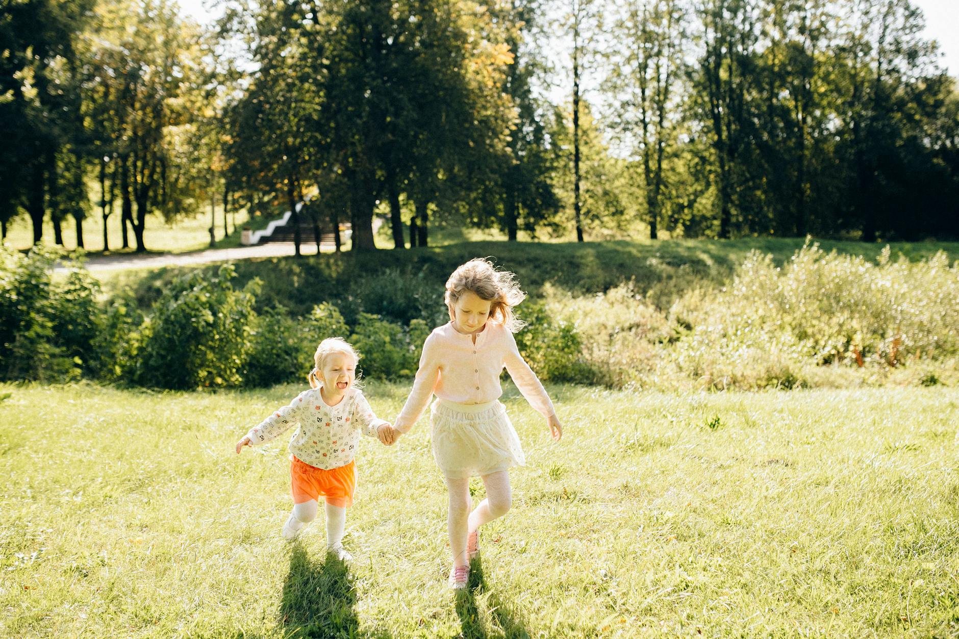 little girls playing at a park