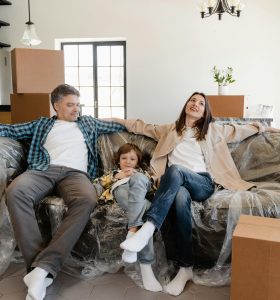 Happy Family Sitting on a Couch