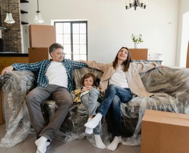 Happy Family Sitting on a Couch