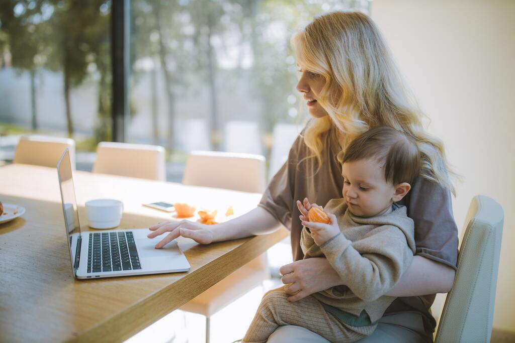 A mom working from home trying to improve her work-life balance.