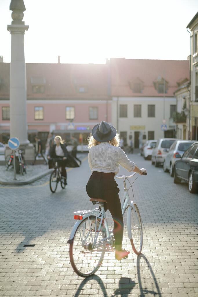 Lady riding bike in town