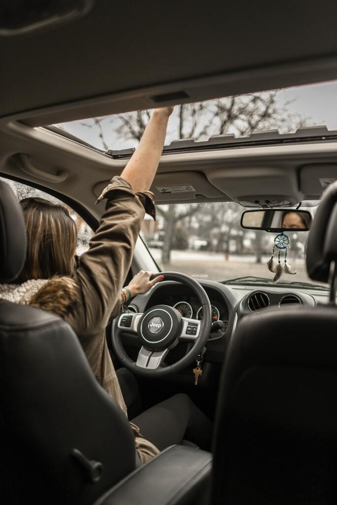Woman Driving a Car