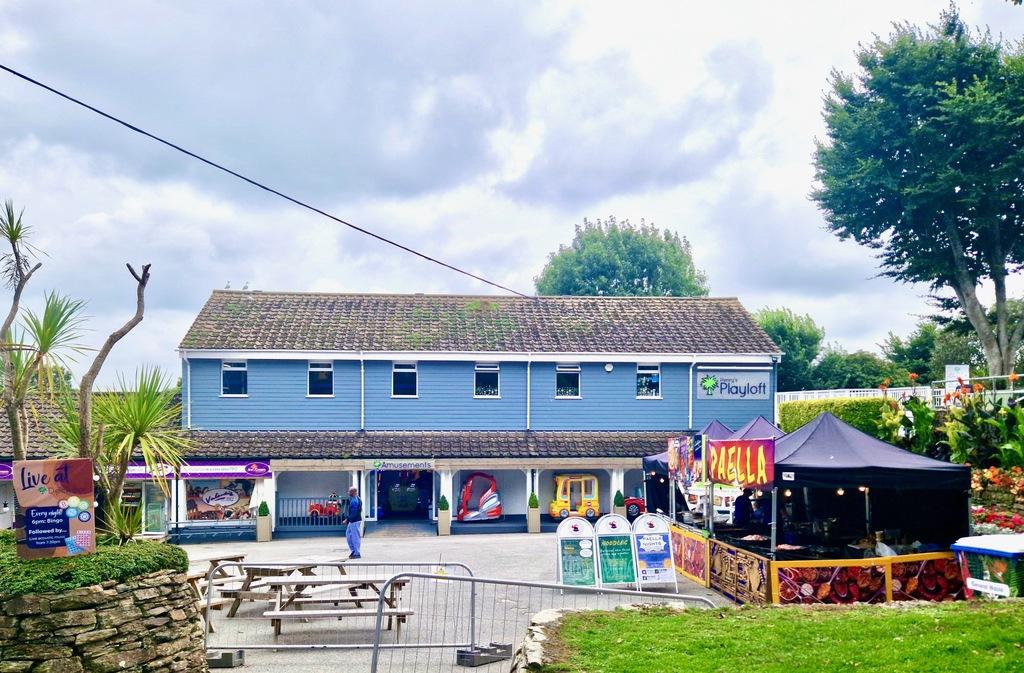 Blue building with pop up food stall