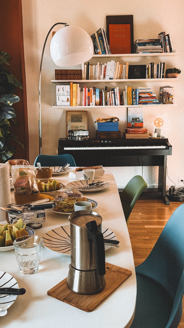 cozy dining and reading space with a piano