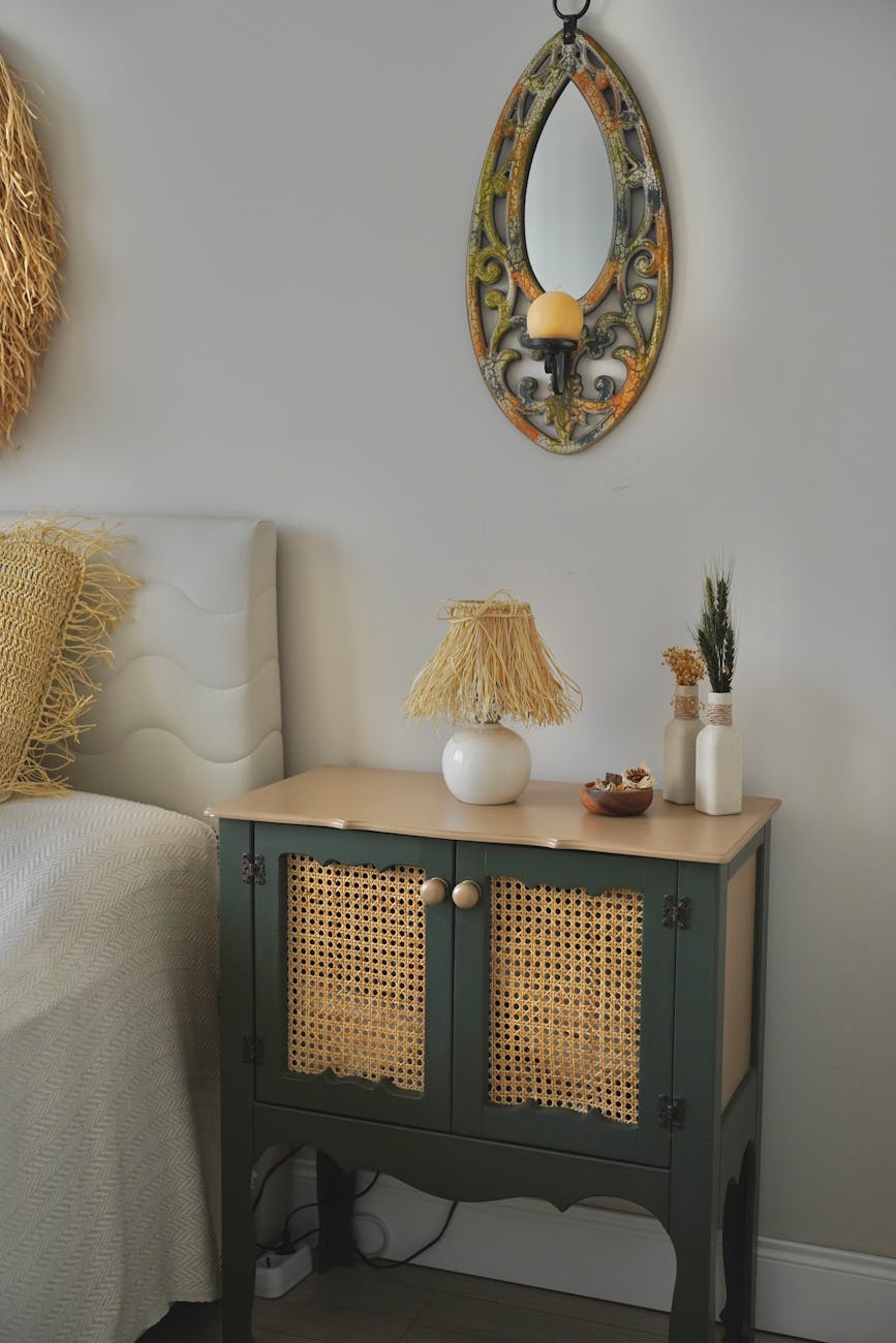 a bedside table in a bedroom