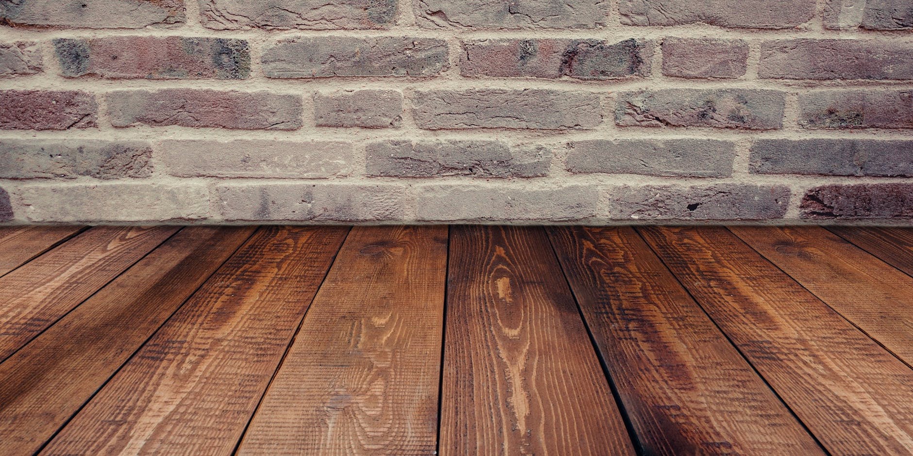 brown wooden panel beside concrete board