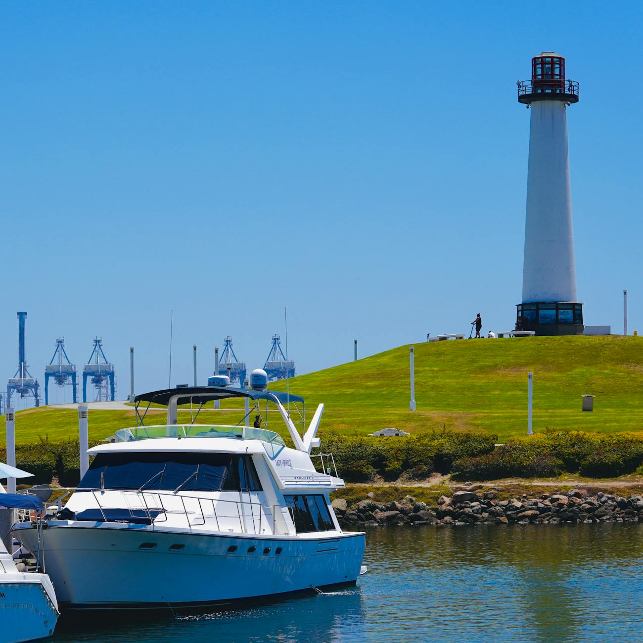 scenic long beach lighthouse and yacht view