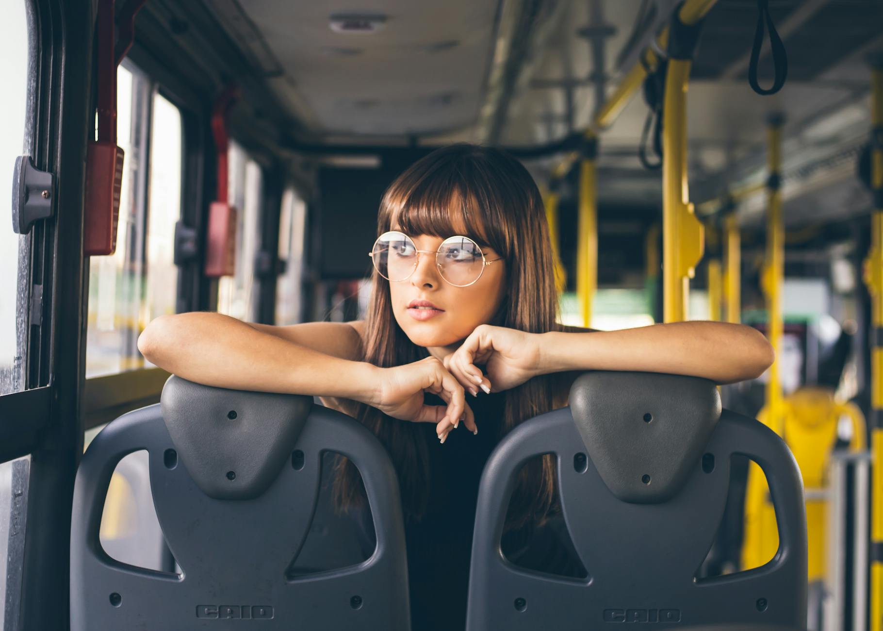 woman riding bus