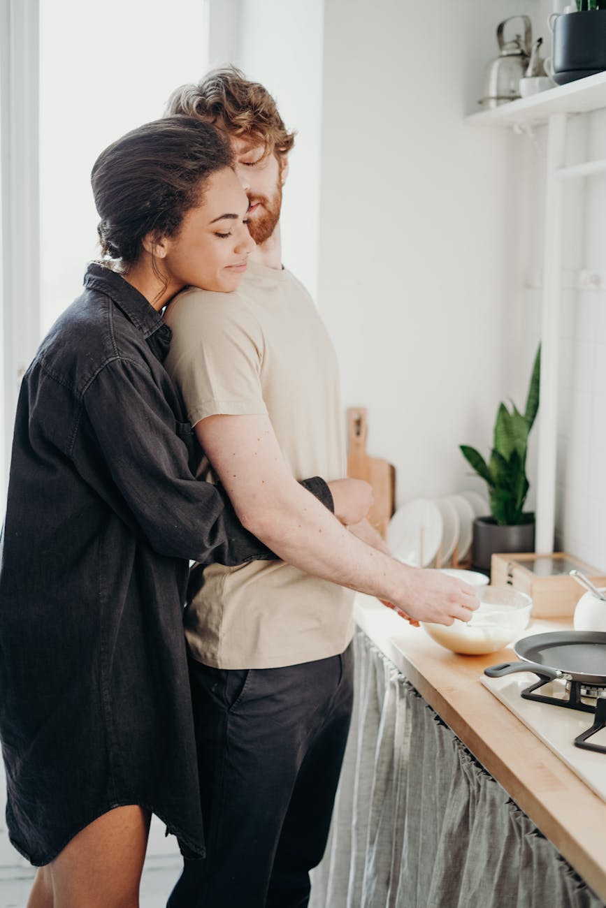 photo of woman hugging her man