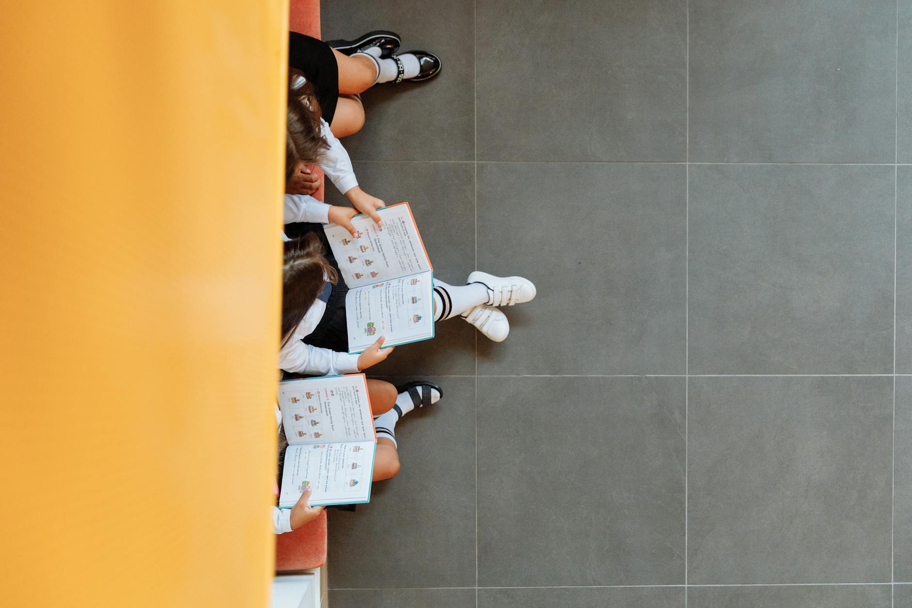 top view of students reading books