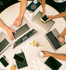 photo of people using laptop